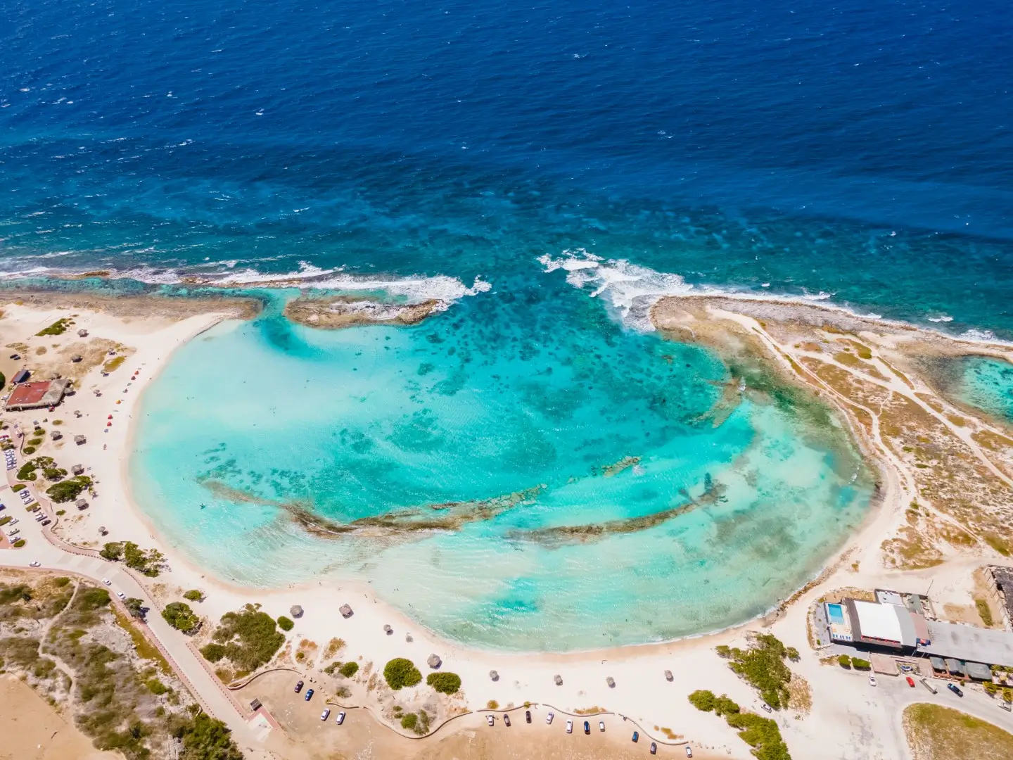 One of the must-visit places during an Aruba tour is the baby beach and coast.