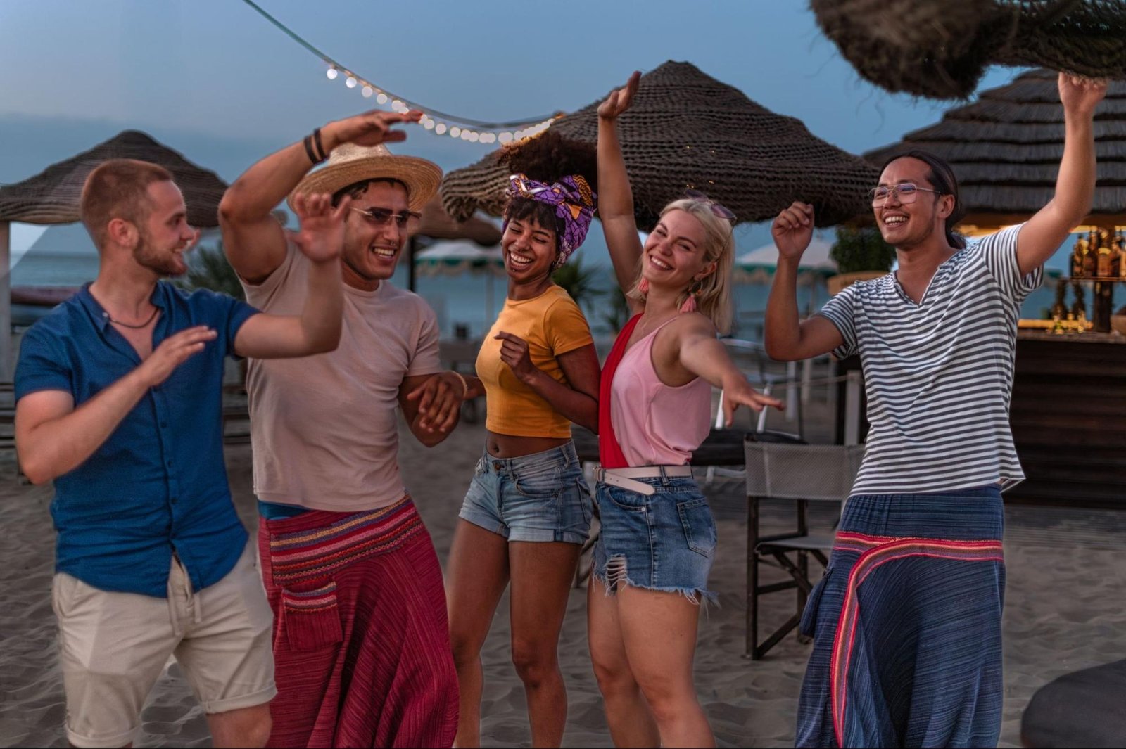 A group of friends partying on a private beach in Aruba.