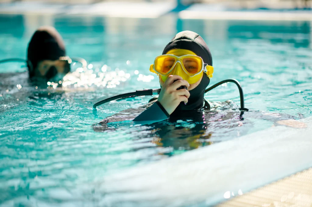 Snuba diver about to go under water