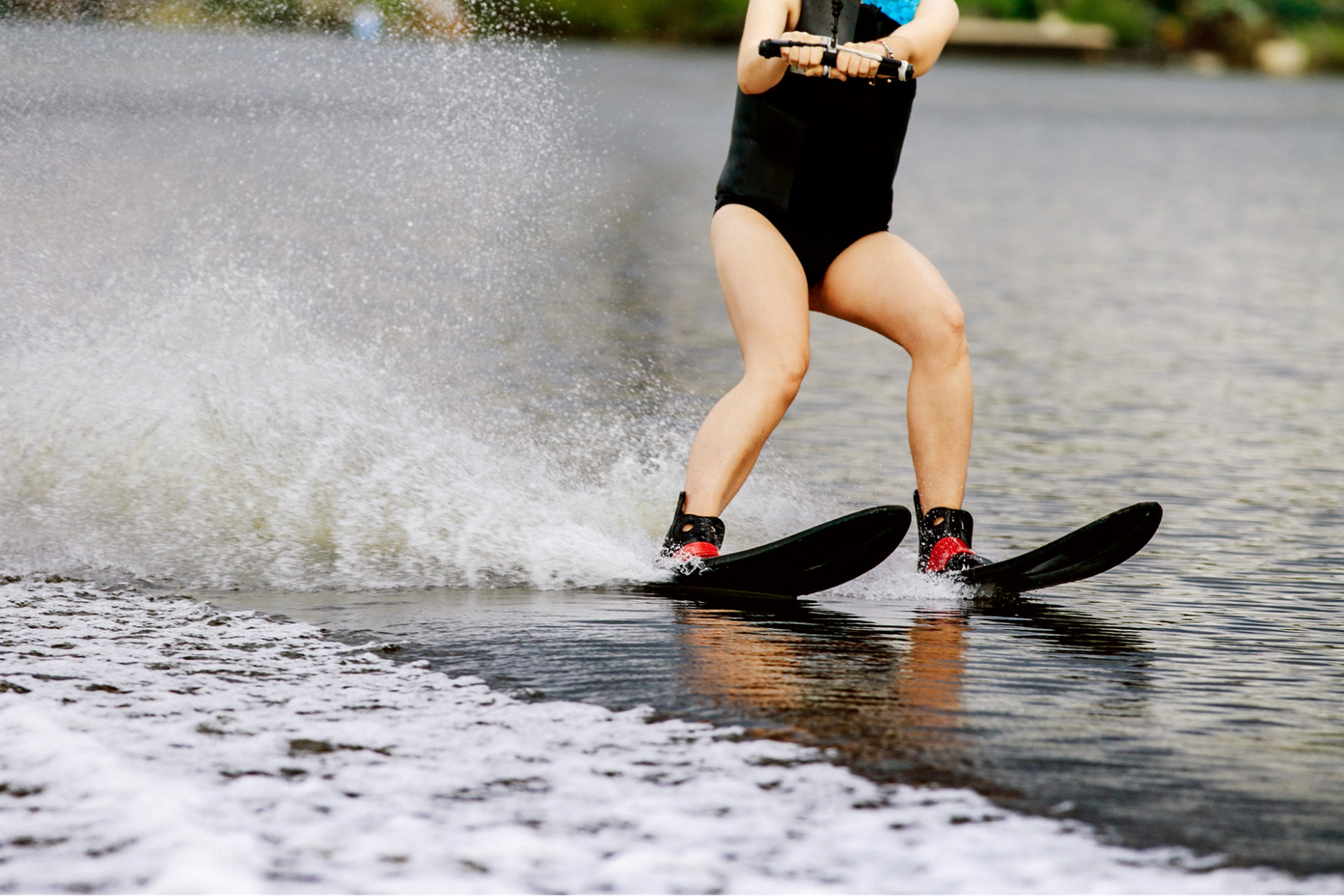 A woman waterskiing.