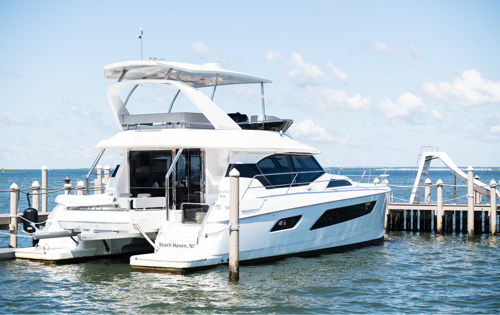 A charter boat docked at the marina.