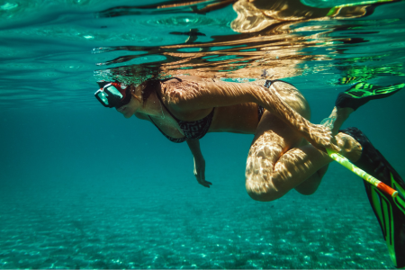 A woman snorkeling